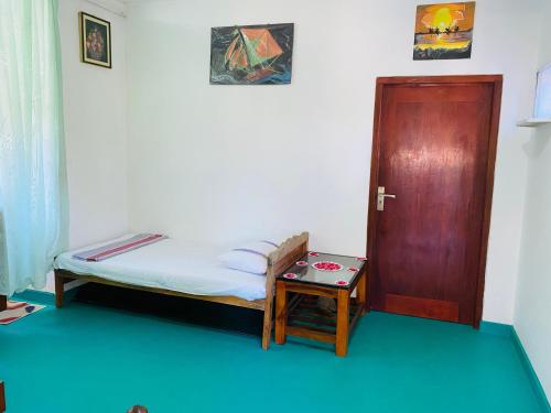 Postel nebo postele na pokoji v ubytování Serene Lumina Mirissa