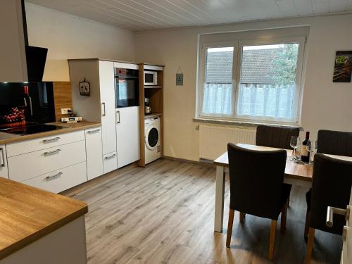 Kuchyň nebo kuchyňský kout v ubytování FeWo Seenland