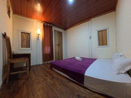 Postel nebo postele na pokoji v ubytování Lumera House