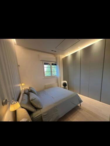 Ένα ή περισσότερα κρεβάτια σε δωμάτιο στο Forte Luxury Apartment