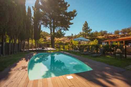 a swimming pool in the backyard of a house at La Buhardilla del Refugio - For hikers, senderistas in Tejeda