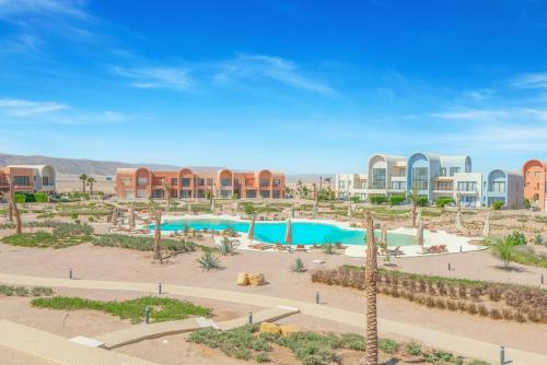 an image of a resort with a pool at Lumina -1 BR Chalet in Kamaran, Gouna in Hurghada