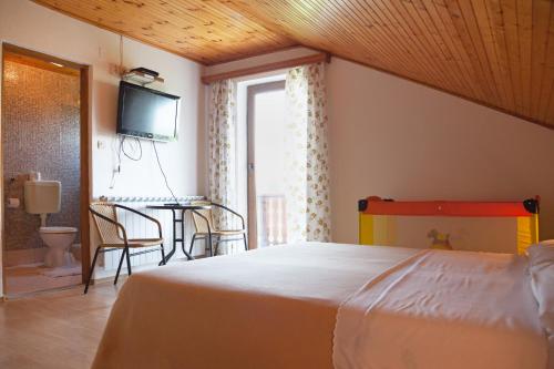 Ένα ή περισσότερα κρεβάτια σε δωμάτιο στο Guesthouse Zafran