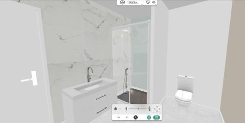 um banheiro branco com uma pia e um vaso sanitário em Gite Ardennais 18 personnes "les gronchons" em Haybes