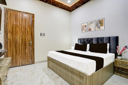 Postel nebo postele na pokoji v ubytování Hotel O Lax