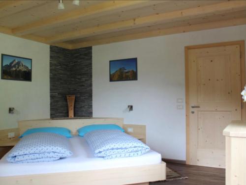 Postel nebo postele na pokoji v ubytování Appartamenti Chantal