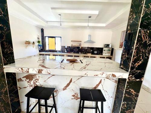 Χώρος καθιστικού στο Home TERANGA hébergement au premier étage