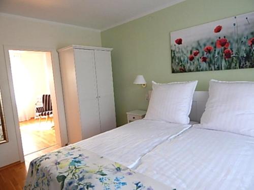 Postel nebo postele na pokoji v ubytování Ferienhaus MAWO