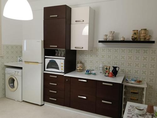 Η κουζίνα ή μικρή κουζίνα στο Casale Lupis