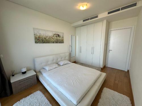 Postel nebo postele na pokoji v ubytování Queen BW