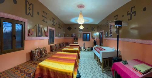 Ένα ή περισσότερα κρεβάτια σε δωμάτιο στο Riad Dades Birds Lodge