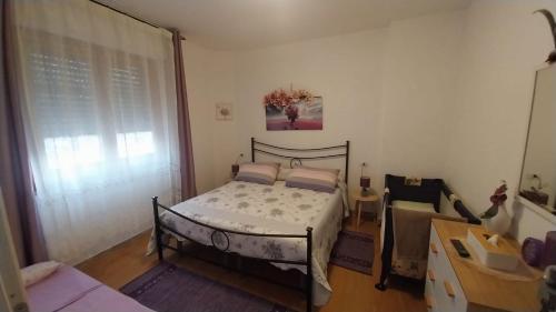 Postel nebo postele na pokoji v ubytování Affittacamere BaLu