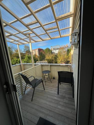 a view of a patio with a glass roof at Sleep with the stars in Oslo