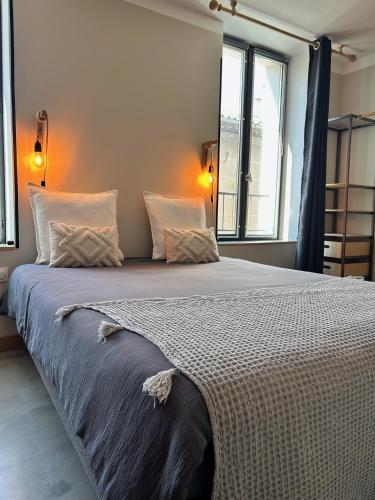 Postel nebo postele na pokoji v ubytování Côté Nuit