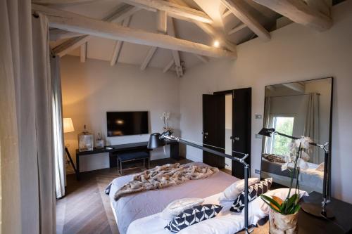 Ένα ή περισσότερα κρεβάτια σε δωμάτιο στο Madame Marconi XVII