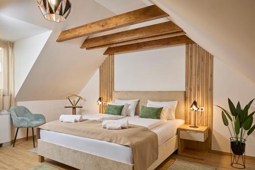 Postel nebo postele na pokoji v ubytování Villa Olea