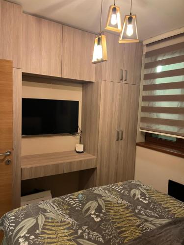 Ένα ή περισσότερα κρεβάτια σε δωμάτιο στο Vivien apartmani