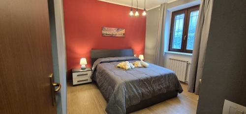 Ένα ή περισσότερα κρεβάτια σε δωμάτιο στο Fante di Coppe