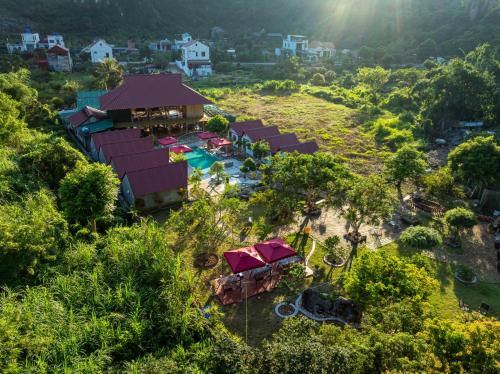 an aerial view of a resort with a playground at Cat Ba Serena Homestay And Swimming Pool in Cat Ba