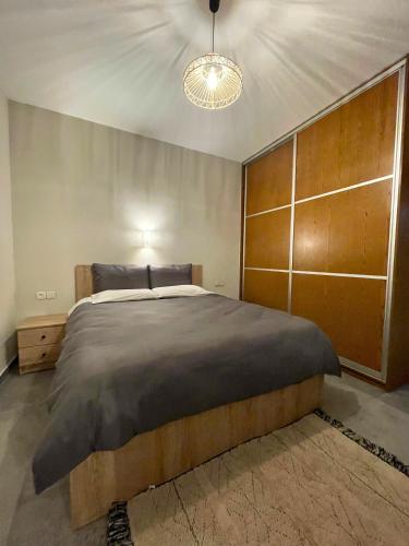 Postel nebo postele na pokoji v ubytování The Cozy Cottage