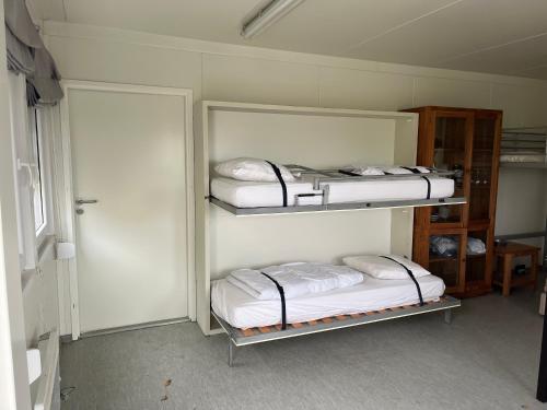 Ένα ή περισσότερα κρεβάτια σε δωμάτιο στο Maikes home