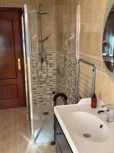 Ванная комната в Vivienda vacacional cuatrocaminos