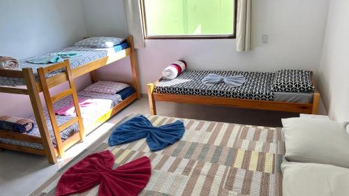 Postel nebo postele na pokoji v ubytování Pousada Cantinho da Mata