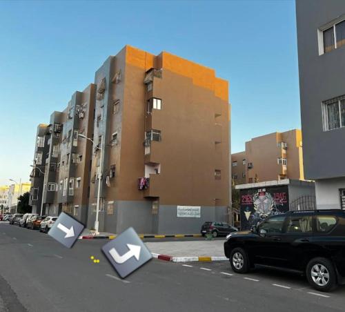 a car parked on the side of a street with arrows at appartement bien situé a SALAM in Agadir