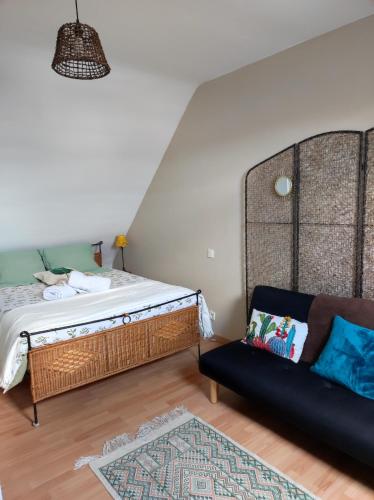 Postel nebo postele na pokoji v ubytování Chez Nanou côté mer