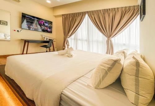 Postel nebo postele na pokoji v ubytování Limited Offer! Spacious Kid-Friendly KidsVille, MystTunnel 5Mins to Legoland JB, Johor Malaysia