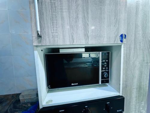 Η κουζίνα ή μικρή κουζίνα στο Urban Crest Apartments