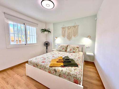 En eller flere senge i et værelse på Casita de Lea