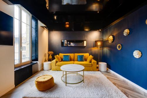 Postel nebo postele na pokoji v ubytování L'Appart Cosy- Hyper centre- Vue sur la collégiale