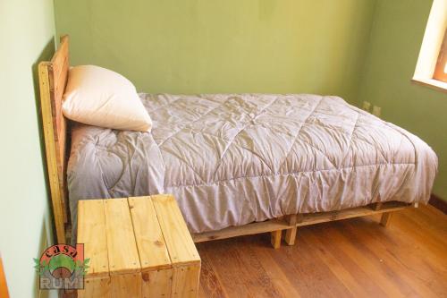 Ένα ή περισσότερα κρεβάτια σε δωμάτιο στο Casa Rumi