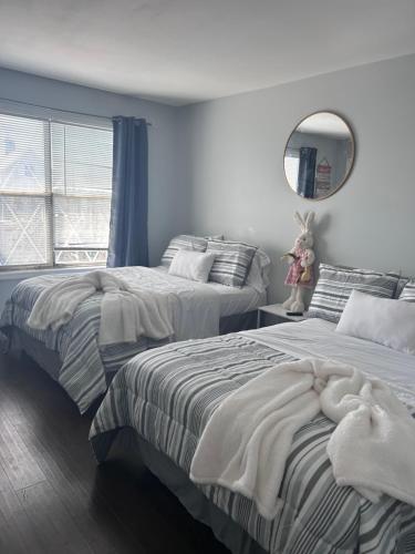 En eller flere senge i et værelse på Kickback and relax