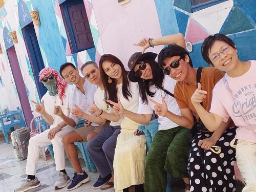 a group of young people posing for a picture at Kamel House in Aswan