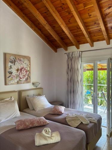 Postel nebo postele na pokoji v ubytování Voula Studio