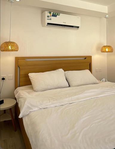 Postel nebo postele na pokoji v ubytování Alula Desert