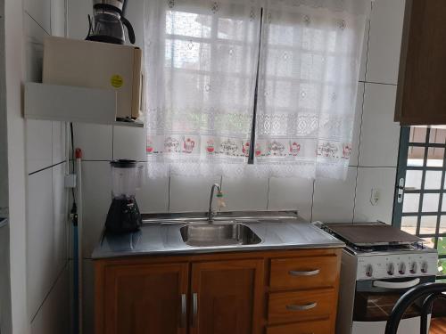 Kuchyň nebo kuchyňský kout v ubytování Aconchego,casa da Su