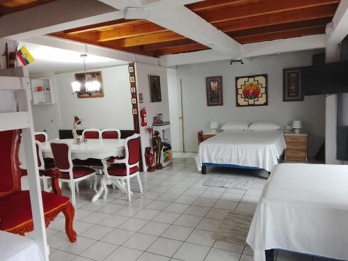 ภาพในคลังภาพของ Aracari Inn Mindo ในมินโด