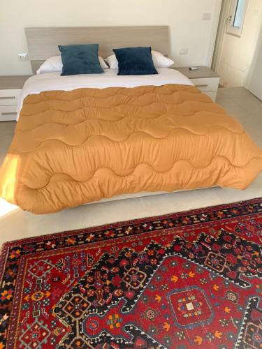 Postel nebo postele na pokoji v ubytování Casa il Melograno