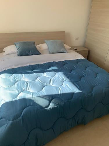 Postel nebo postele na pokoji v ubytování Casa il Melograno