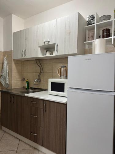 Kuchyň nebo kuchyňský kout v ubytování A&N Apartments