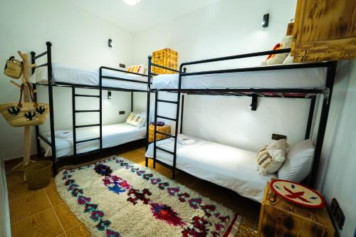 Postel nebo postele na pokoji v ubytování Mabidi Surf Taghazout