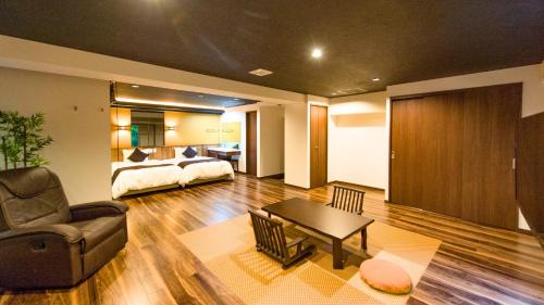 Postel nebo postele na pokoji v ubytování LiVEMAX RESORT Hakone Sengokuhara