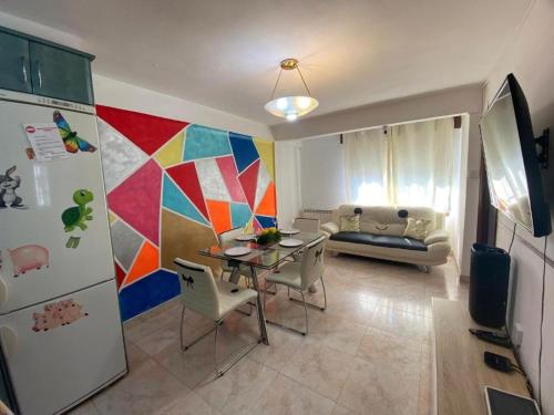 TV a/nebo společenská místnost v ubytování Familia y Grupos Luces Navidad VIGO