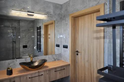 a bathroom with a wooden sink and a mirror at Dom pod Tatrami - Brzegi - Bukowina Tatrzańska in Brzegi
