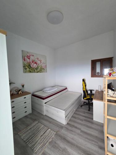 Ένα ή περισσότερα κρεβάτια σε δωμάτιο στο Casa Timoteo