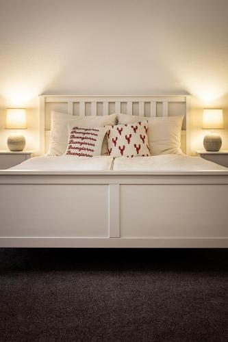 Ένα ή περισσότερα κρεβάτια σε δωμάτιο στο Rheinblick und Yachthafen mit privatem Stellplatz