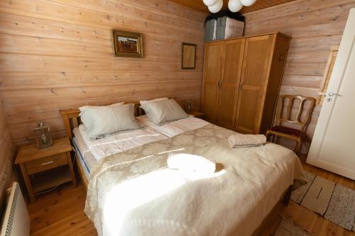 Postel nebo postele na pokoji v ubytování Big Villa Lummelahti, lake Saimaa